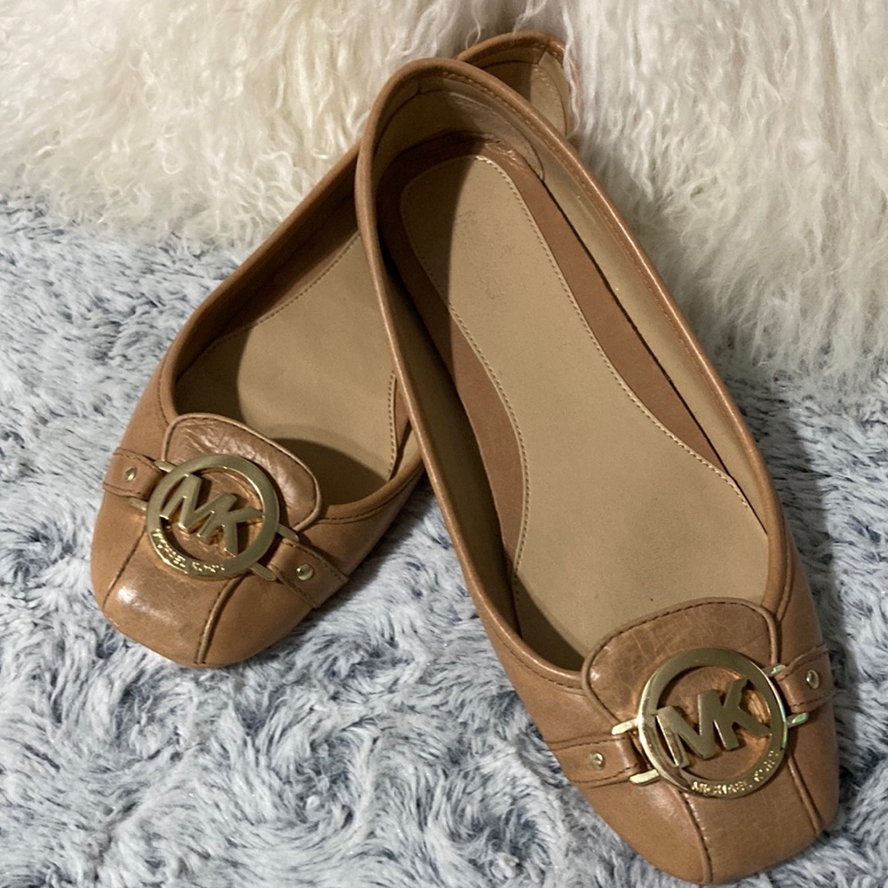 Michael Kors slip on shoes.